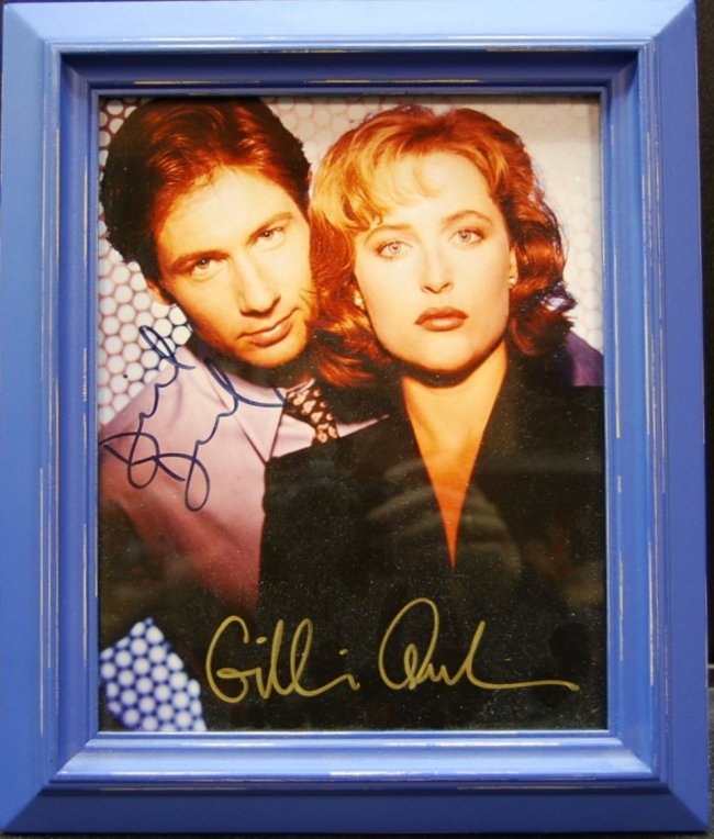 Framed picture autographed by 'The X-Files' stars David Duchovny and Gillian Anderson. Courtesy of LiveAuctioneers.com archive and Four Seasons Auction Gallery.