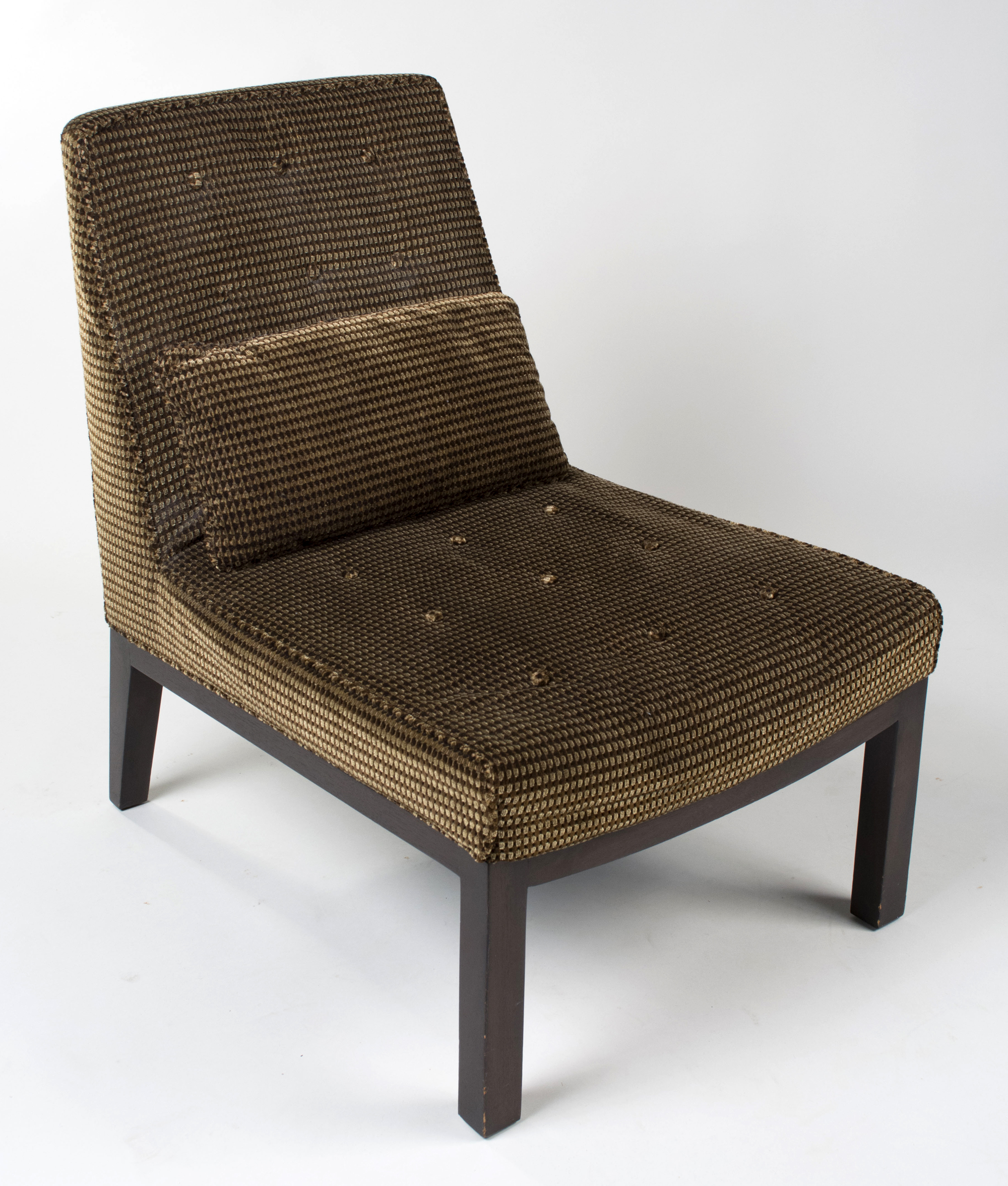 One of a pair of Dunbar lounge chairs. Est. $2-$3,000