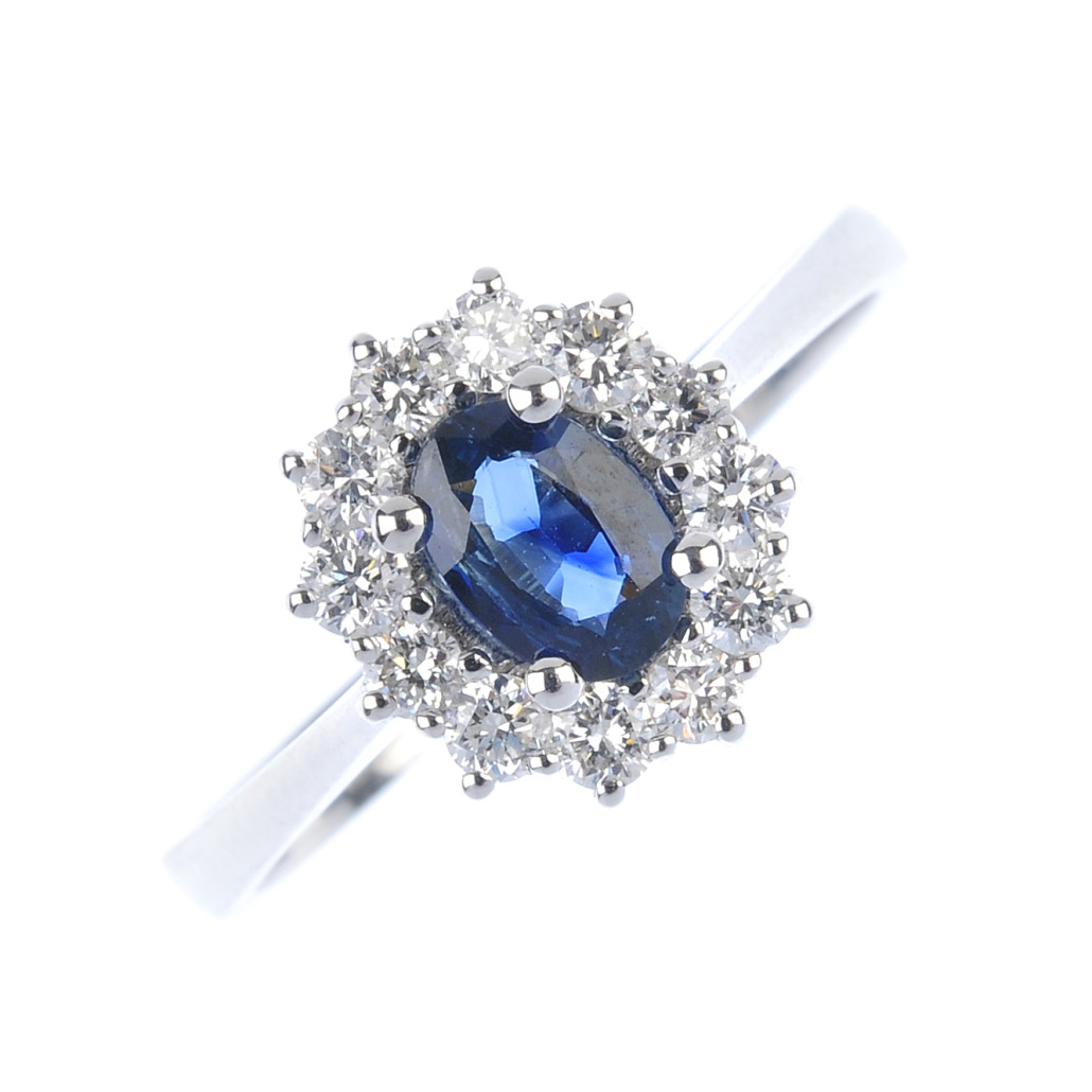 Lot 18 – An 18K gold sapphire and diamond cluster ring. Estimate: £200-£300. Fellows image 
