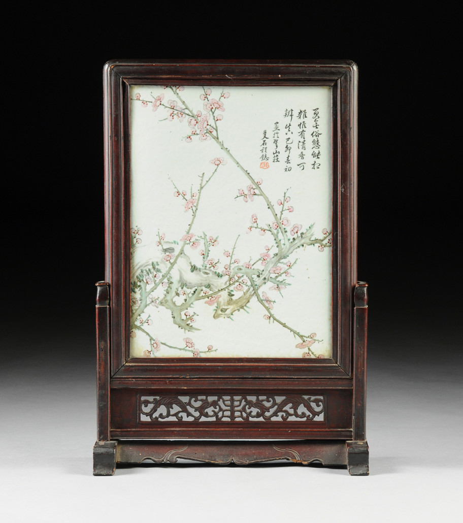 This Chinese Famille Rose porcelain plaque mounted hardwood table screen achieved $26,730. Simpson Galleries image