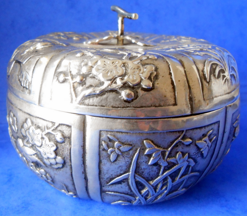 Chinese Export silver bowl and cover, embossed floral panels. Estimate: £100–£120. Heliers Auctions image