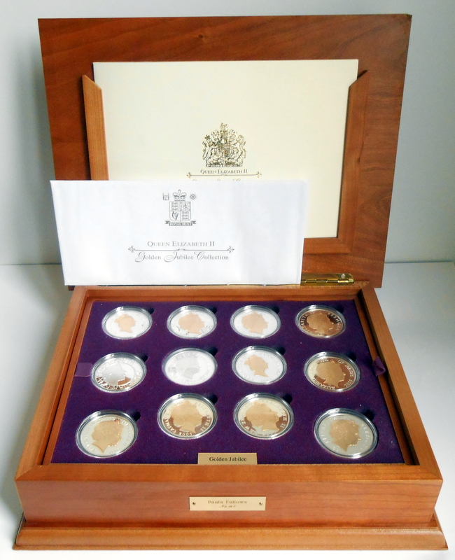Queen Elizabeth II Golden Jubilee 24 silver proof coins in wooden case, 684 grams. Estimate: £400–£600. Heliers Auctions image 