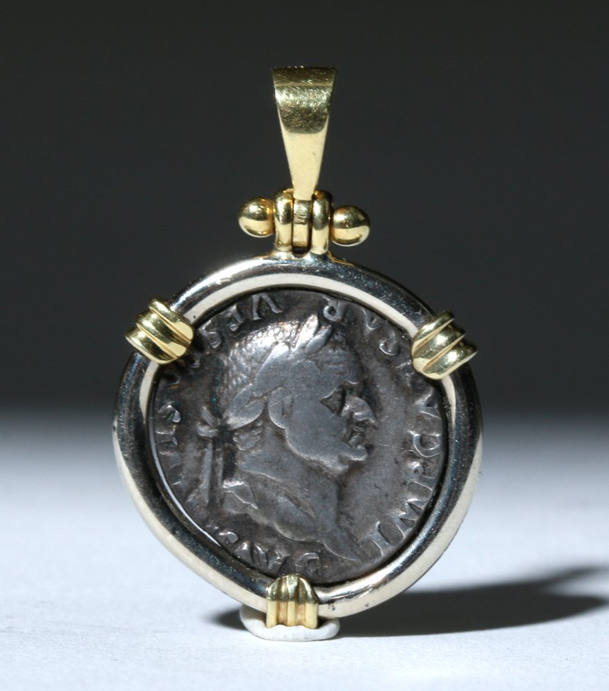 Roman Vespasian silver Denarius in an 18K gold bezel, A.D. 69 to 79 C.E. Estimate: $900-$1,200. Artemis Gallery Live image
