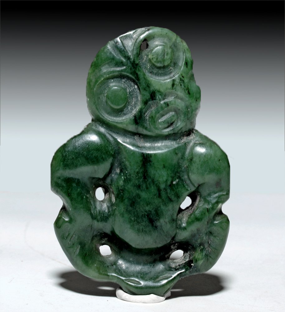 Maori carved green nephrite jade hei tiki pendant, New Zealand, 19th century, 4 inches long. Estimate: $10,000-$15,000. Artemis Gallery image
