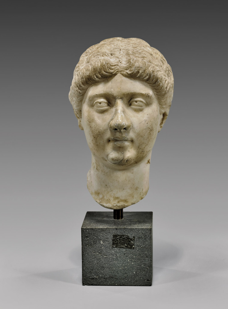 Roman marble portrait bust: Empress Bruttia Crispina, wife of Emperor Commodus, 10 1/4in, on a stone base. Estimate: $15,000-$20,000. I.M. Chait Gallery / Auctioneers image
