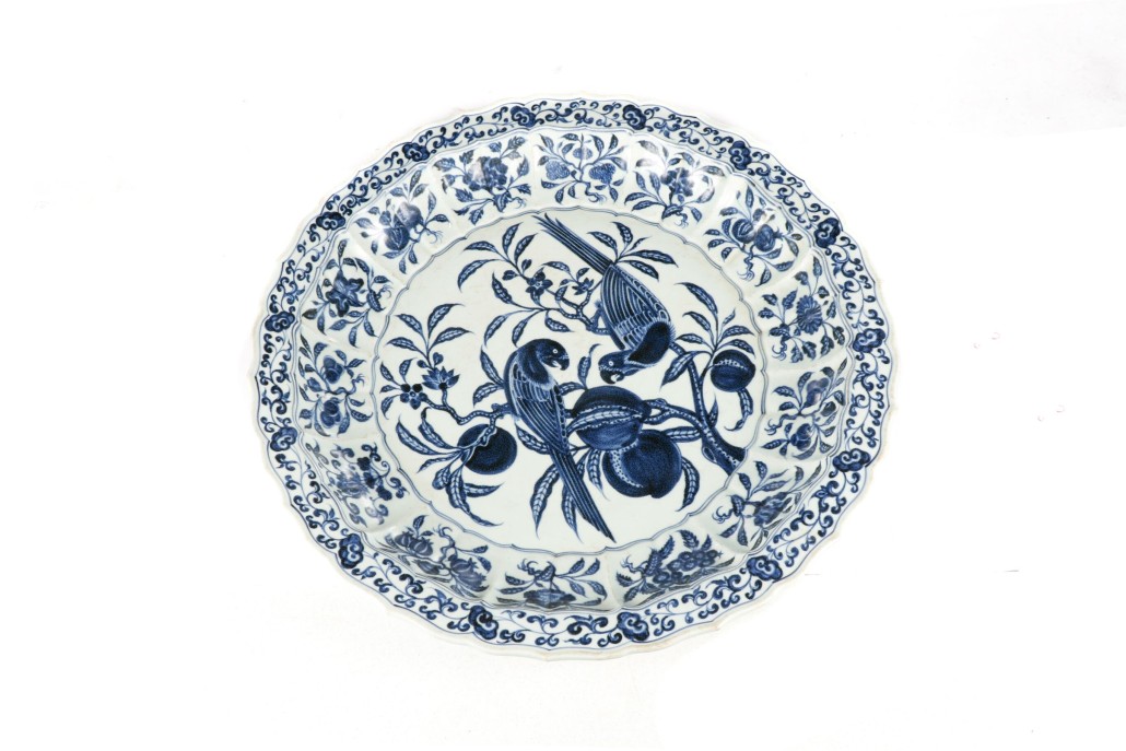 Unmarked Chinese palatial low porcelain center bowl with parrot decorations, 24 3/4 inches in diameter, early 20th century. Price realized: $20,060. Ahlers & Ogletree image