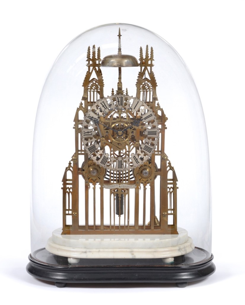 A good large brass striking skeleton clock striking on a bell, signed Latch, Newport, circa 1870. It sold for £2,300. Photo Tennants Auctioneers