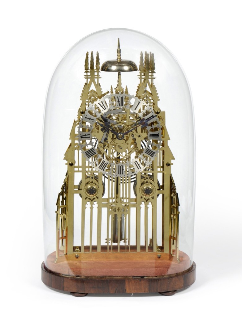A brass striking skeleton clock modeled as York Minster, circa 1870, sold for £4,400. Photo Tennants Auctioneers