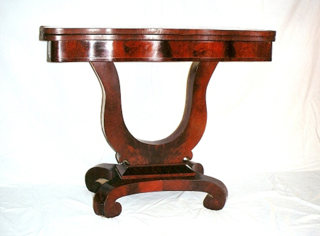 An Empire game table of the 1840s.
