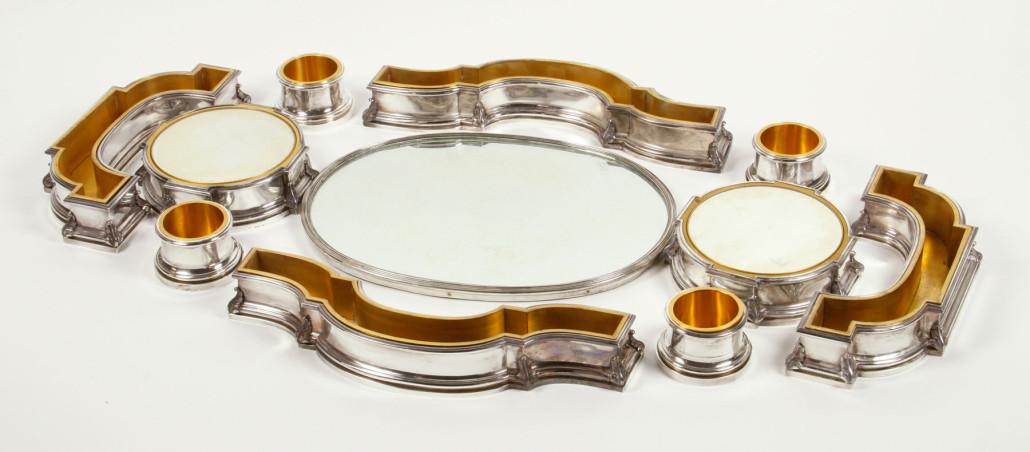 Lot 2272 –10-piece French mirrored garniture set with brass inserts. Kaminski Auctions image