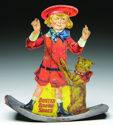 Buster Brown and Tige have been the faces in ads for Buster Brown shoes since 1904. This tin sign, made to rock on a store counter, auctioned for $1,778 in 2015.