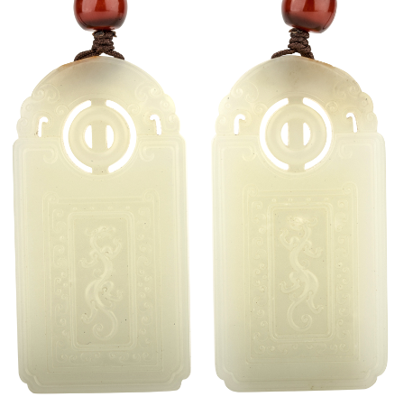 Pair of Hetian jade (nephrite) pendants. L&H Auction image