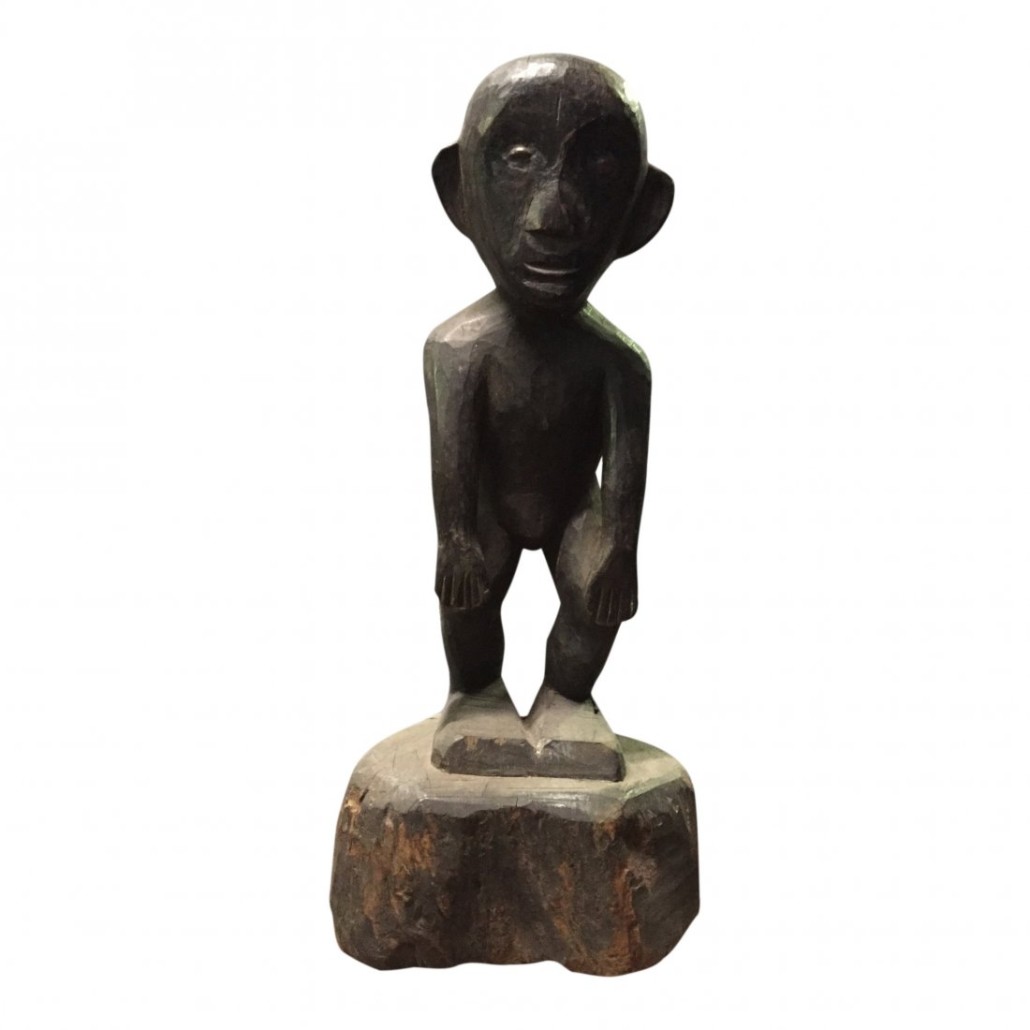 Lot 20 – Crouching bulul statue with hands on knees, 19.75in tall x 8.5in wide. Estimage: $450-$550. Last Chance by LiveAuctioneers image