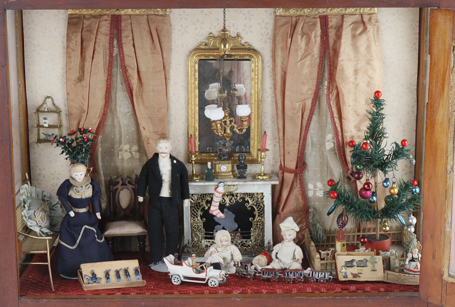 Christmas room box, late 19th/early 20th century, with four bisque dolls and Christmas feather tree. Ex Flora Gill Jacobs collection, book example. Est. $2,000-$3,000