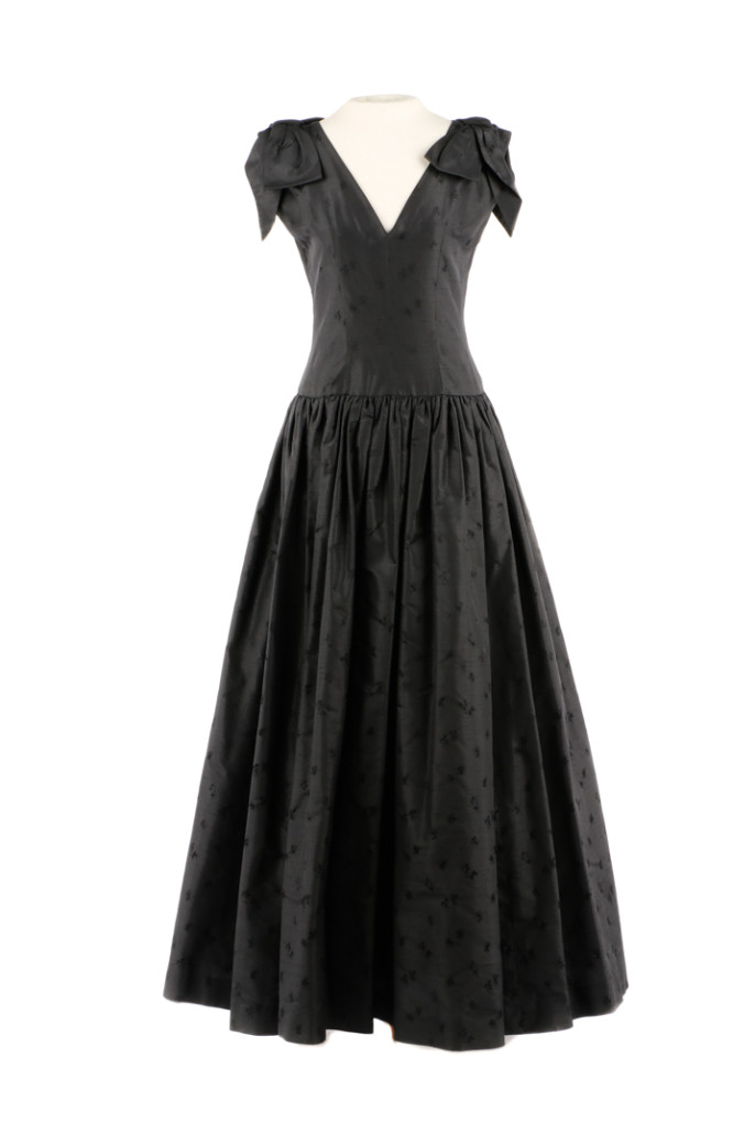 Chanel black silk taffeta sleeveless ball gown with drop waist and V-neck collar and back, circa 1981. Ahlers & Ogletree image