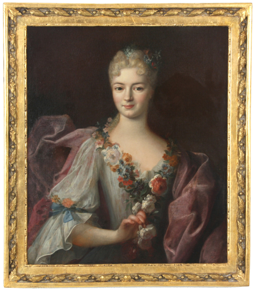 Framed portrait of a young woman with flowers in her hair and clutching a rose, unsigned but attributed to Jean-Marc Nattier (French, 1685-1766). Estimate: $15,000-$25,000. Fontaine's Auction Gallery image