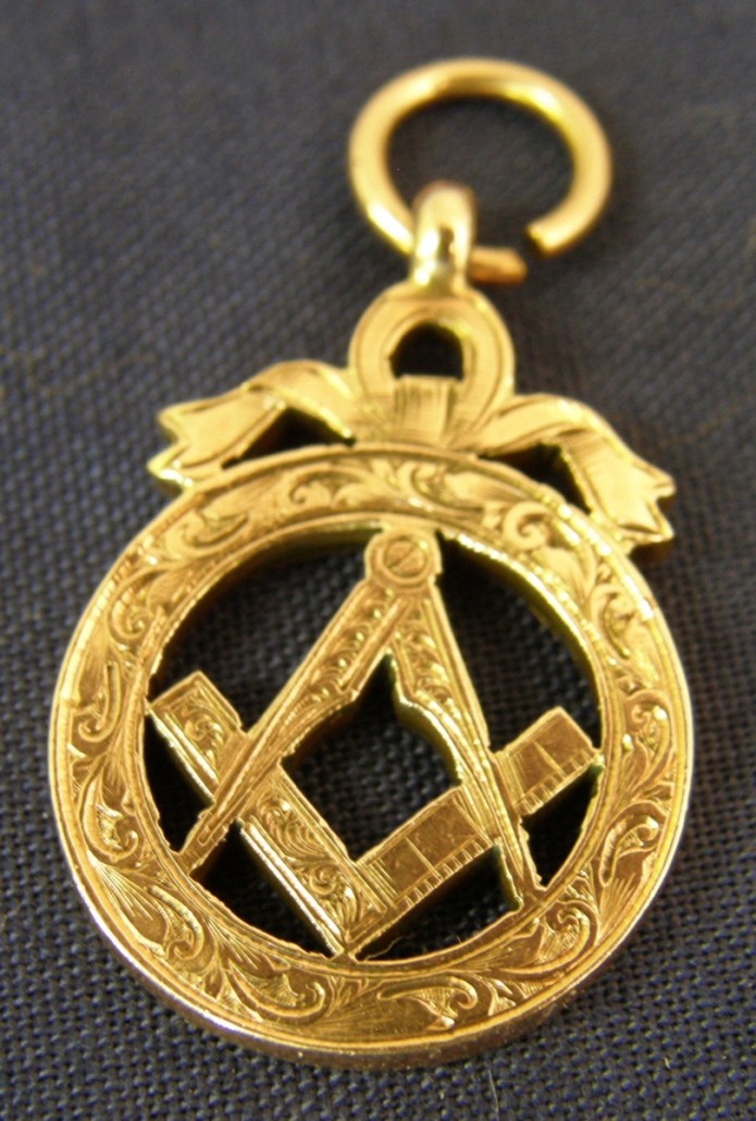 A 9K gold Masonic jewel with compass and set square hallmarked in Birmingham in 1864. It sold for £40. Photo Ewbank’s Auctioneers
