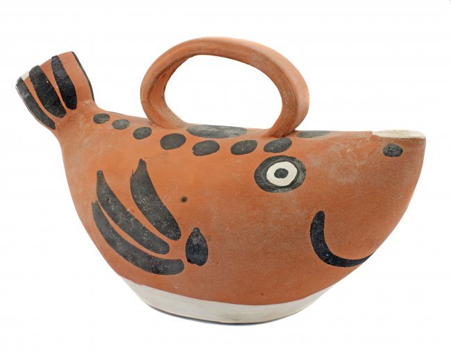 Red earthenware fish-form pitcher by Pablo Picasso conceived in 1952 and executed in 1962, one of 500. Price realized: $3,900. A.B. Levy’s image