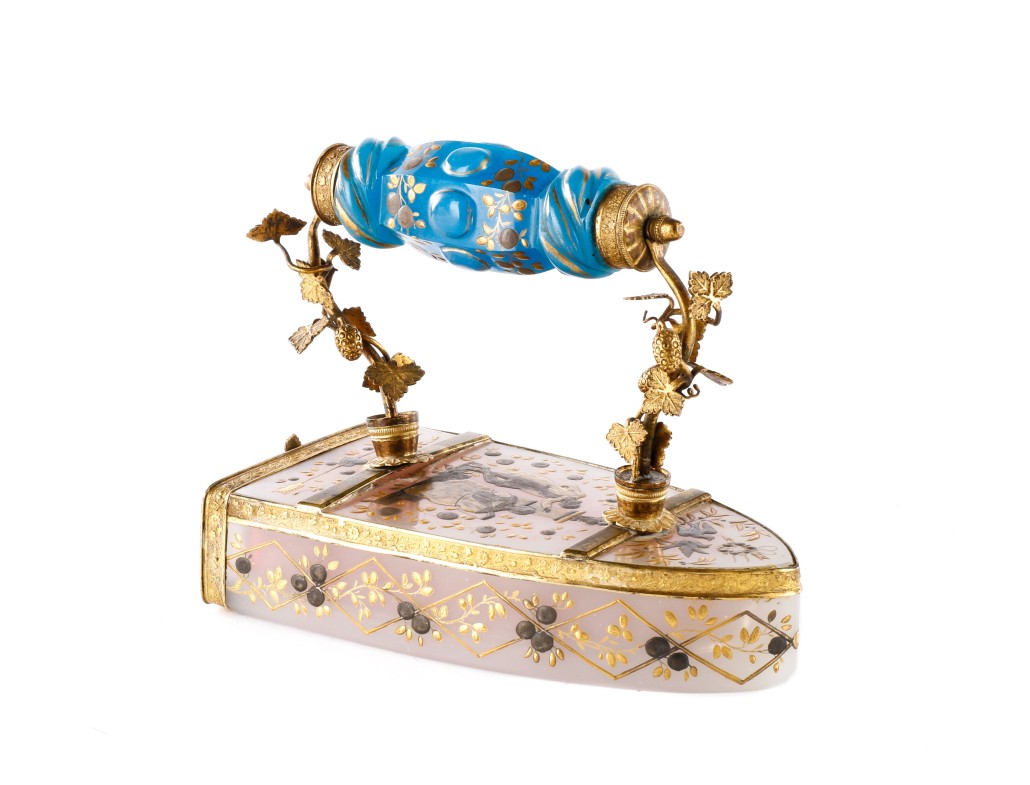 Unusual French glass, gilt metal and enamel candy dish shaped like a sadiron. Price realized: $18,880. Ahlers & Ogletree image