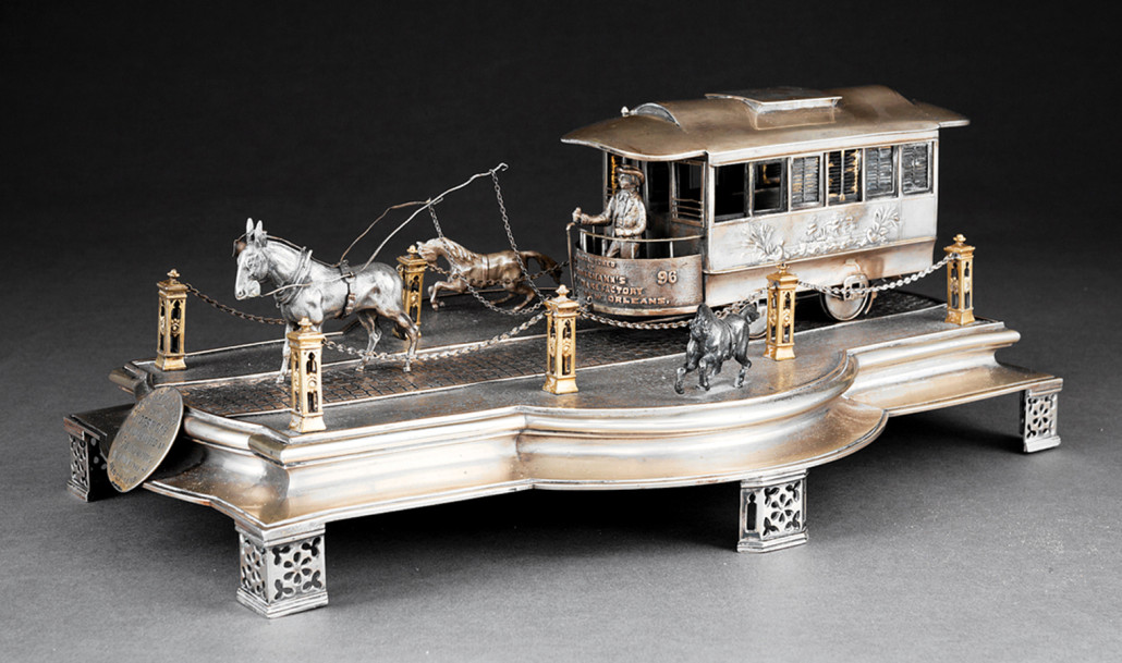 Rare New Orleans coin silver and silver gilt exhibition model of a mule-drawn streetcar. Price realized: $43,325. Neal Auction Co. image