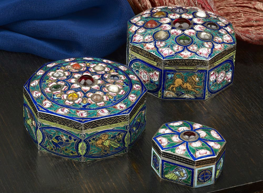 Three similar Indian pandan or betel boxes with hinged covers. Estimate: £500 – £700. Fellows image