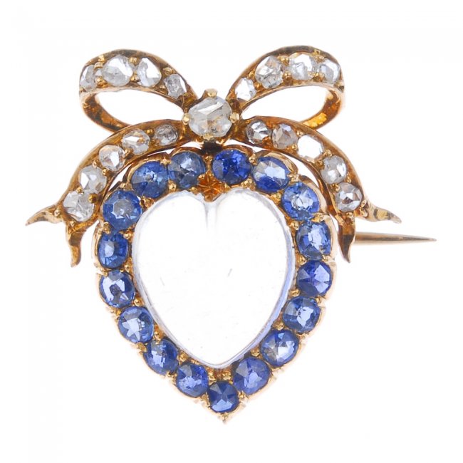 Moonstone, sapphire and diamond heart and bow brooch, est £400-£600. Fellows image