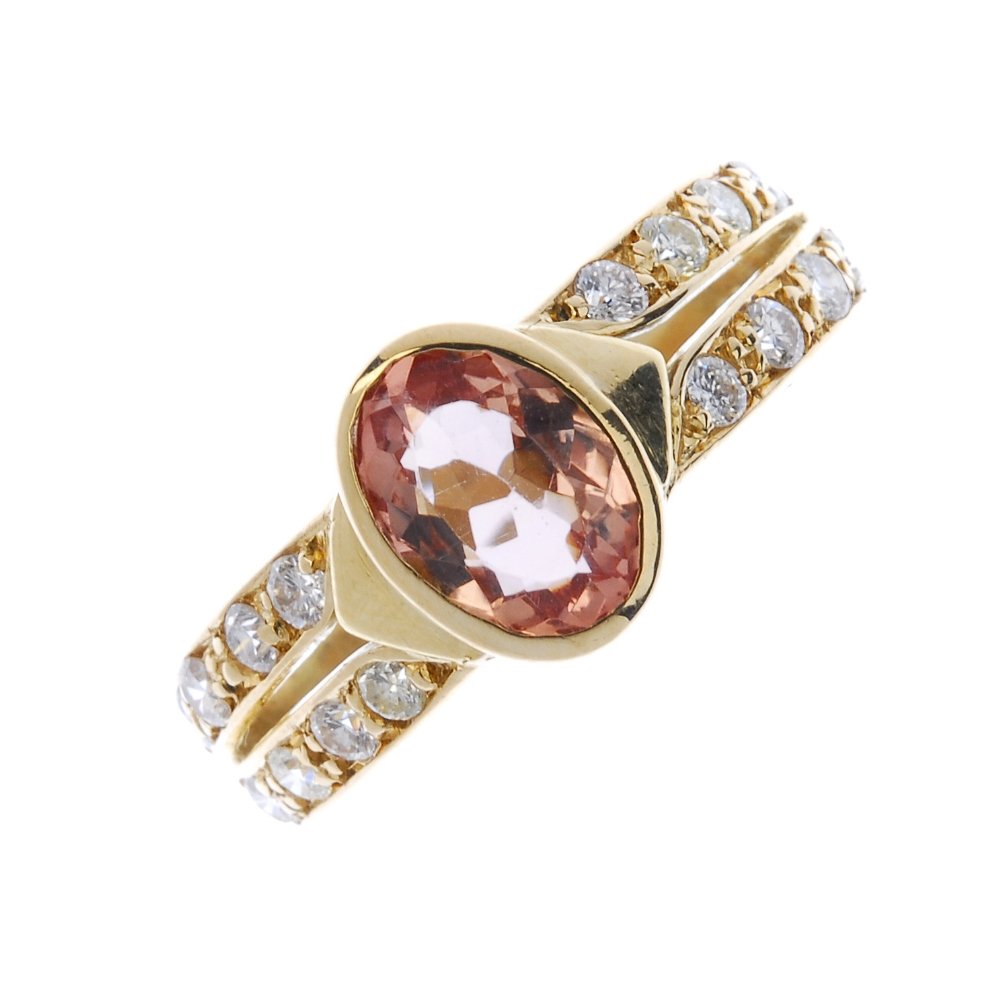 Topaz and diamond dress ring, est £100-£150. Fellows image