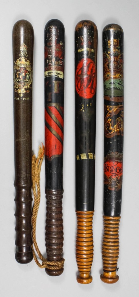 A Birmingham Special Constabulary truncheon (far left) and three others together estimated at £200-£250. Photo The Canterbury Auction Galleries
