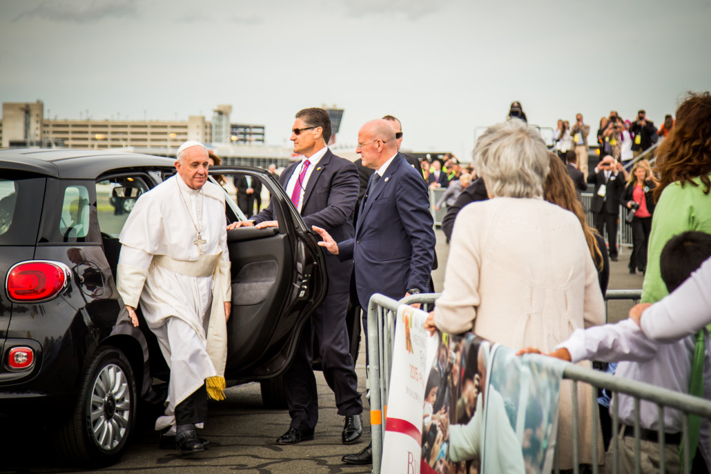 Pope Francis exiting the Fiat car that will be sold Friday by Automobile Dealers Association of Greater Philadelphia. Photograph courtesy of the World Meeting of Families—Philadelphia 2015/J. DiGidijunis