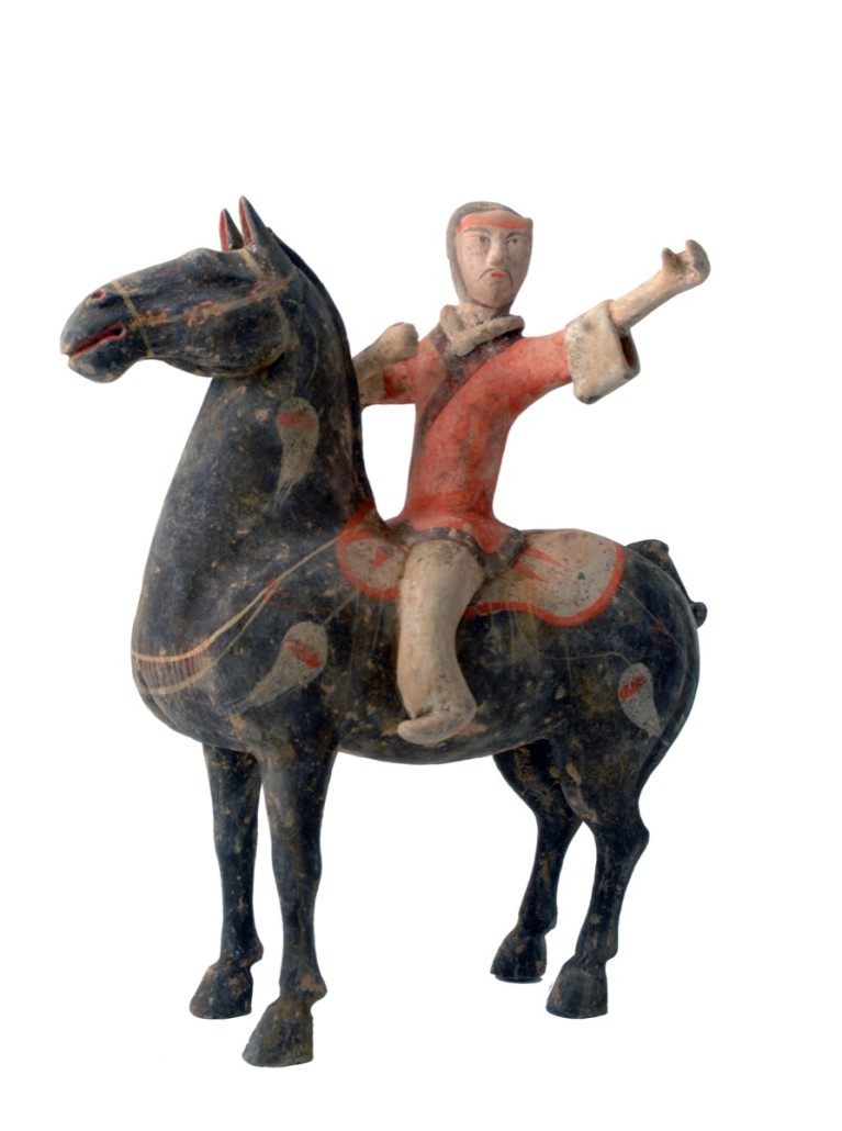 A Chinese Han dynasty earthenware horse and ride with some original paint remaining. It sold for £2,500. Photo Paul Burnett 