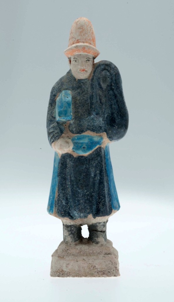 A Ming dynasty court attendant, probably a scribe as he is carrying brushes. Photo Paul Burnett