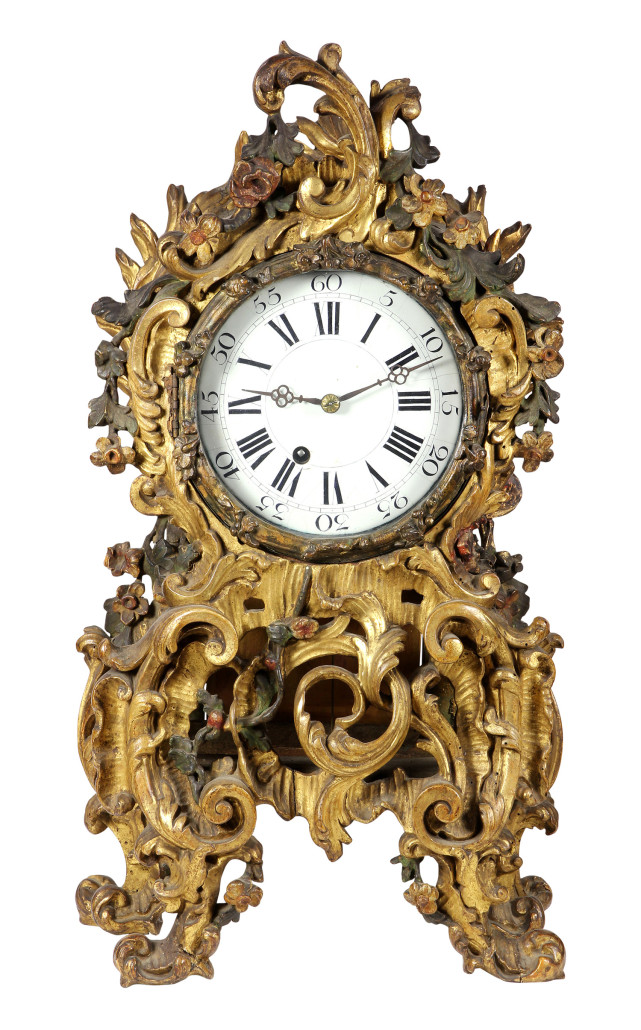The Christian deGuigné IV Collection includes this early 18th century Rococo cased giltwood carved mantel clock which is expected to earn $3,000-$5,000. Clars image