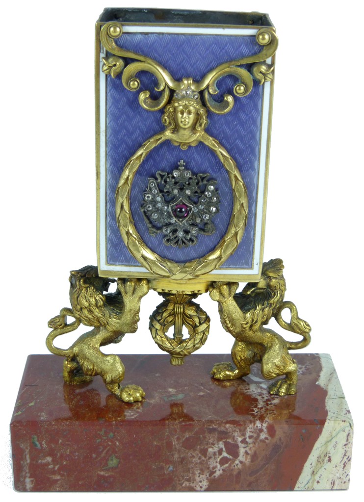Lot 14 – Russian guilloche blue enameled silver match case holder on a marble plinth. Estimate: $1,500-$2,500. Antiques & Modern Auction Gallery image