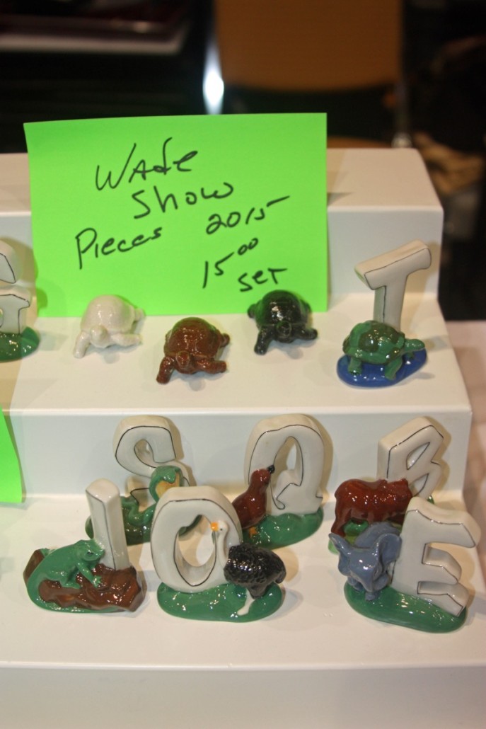 More recent Whimsies. The three turtles on the top shelf were commissioned for the 2015 Summer Wade Fest, a show held over the last weekend of July every year in Pennsylvania. Carolyn was asking $15 for the set (£10). The lower shelf has more Alphabet Whimsies. Photo author